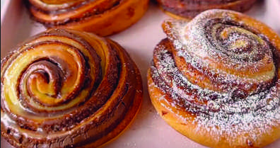 P&atilde;ozinhos recheados com creme de avel&atilde; e polvilhados com a&ccedil;&uacute;car.